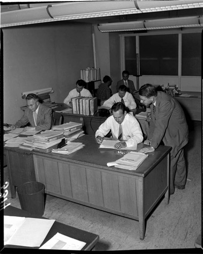 Men working in an office