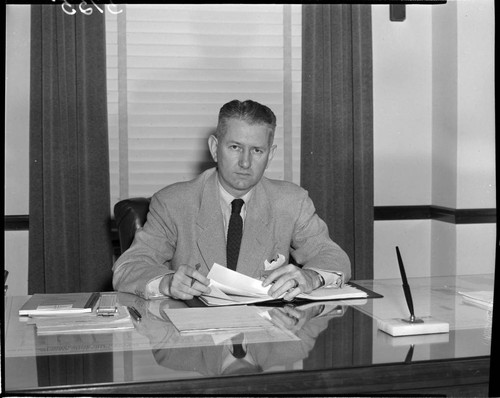 Man seated at desk