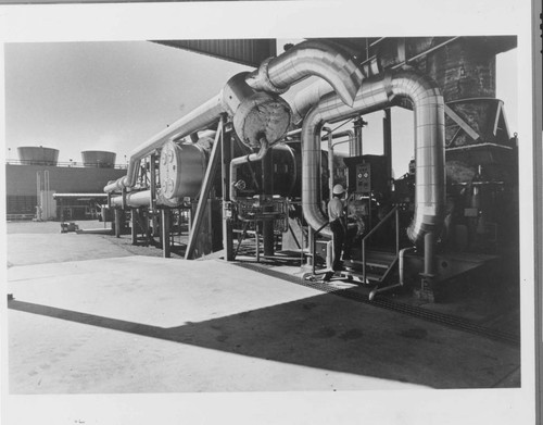 Highly saline geothermal fluids are run through complex piping to extract steam to generate 10,000 kilowatts of electricity at the Brawley Geothermal Plant