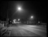 Street scene and streetlights near unknown substation