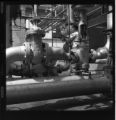 Man conducting tests at a Steam Plant or a Water Desalination Plant