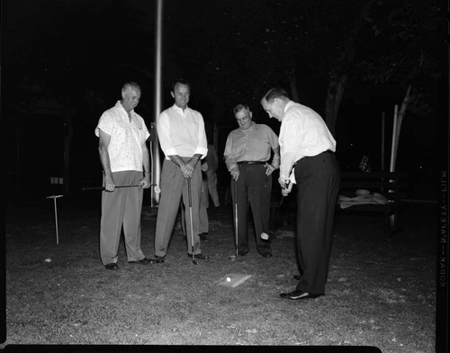 Golf foursome on the tee