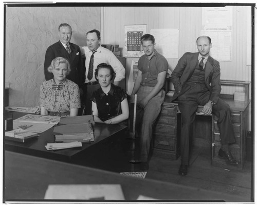 Office staff at print shop with Mr. Smith