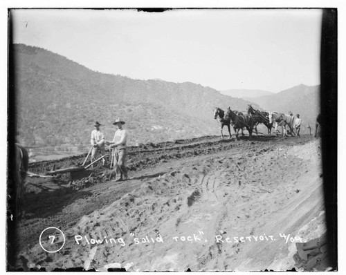 Men plowing "solid rock" at the reservoir with horse teams at Kaweah #2 Hydro Plant