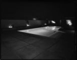 Pool lighting and a family at home