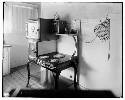 Westinghouse Electric range with iron in upper corner and an electric timeing device