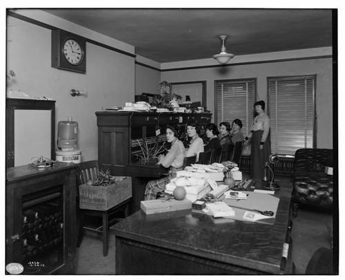 Telephone Booth and Girls Phone supervisor and 5 women operators at switchboards