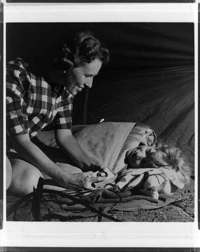 campers sleeping with electric blanket in a tent