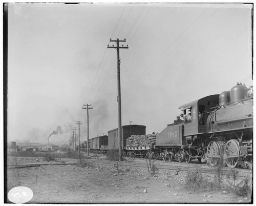 Transmission lines along Southern Pacific tracks at an unknown location