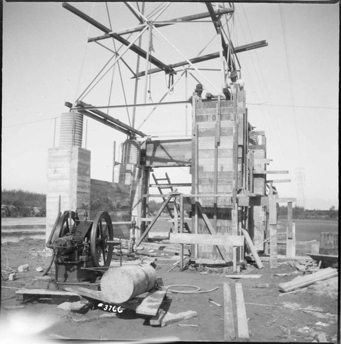 Tower 101 rebuilt with huge concrete base near marsh