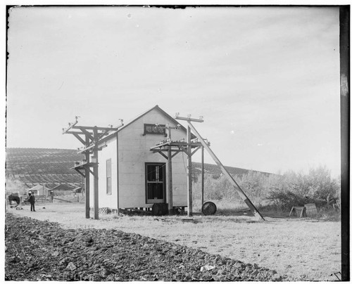 An exterior view of Exeter Substation #2 showing transmission lines and ...