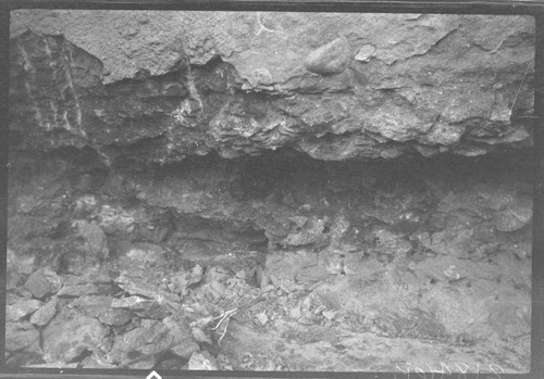 Dam 1. Badly disintegrated and porous concrete in vertical joint near station 5-66, elevation 6904 after partial removal
