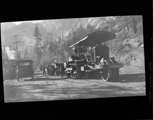 Early model Caterpillar tractors used to haul materials to Rush Creek plant site from Benton RR station 56 miles away