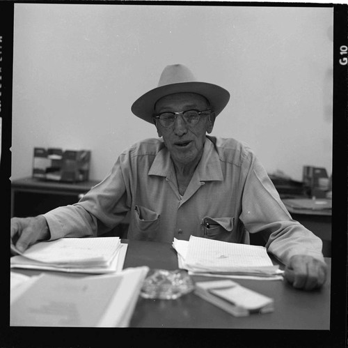 Hydro Generation Supervisor E. I. Bulpitt at his desk