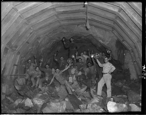 Group photo of tunnel crew in mouth of Big Creek 4's power tunnel