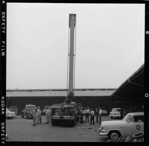 Bucket raised at service center