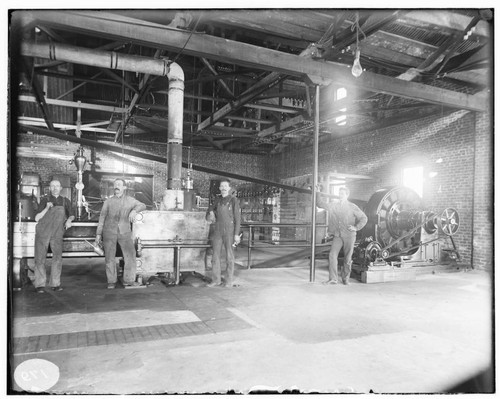 The operating crew standing in the Pasadena Steam Plant