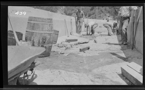 Men repairing a break in the conduit at Kaweah #3 Hydro Plant