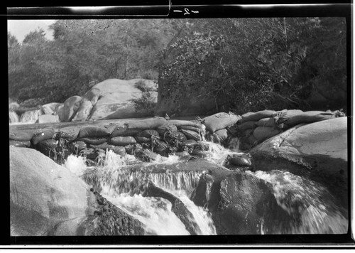 A sack dam on the Tule River at the gauge