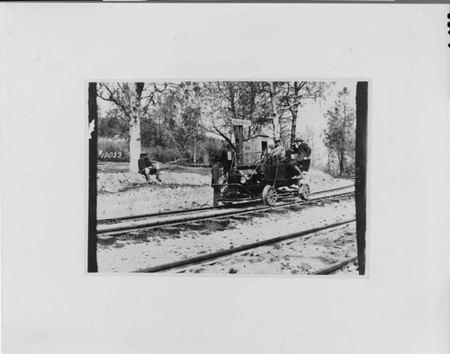 The versatile Model T Ford was easily converted into a railroad "speeder" for the benefit of official inspection tours and unofficial hunting trips