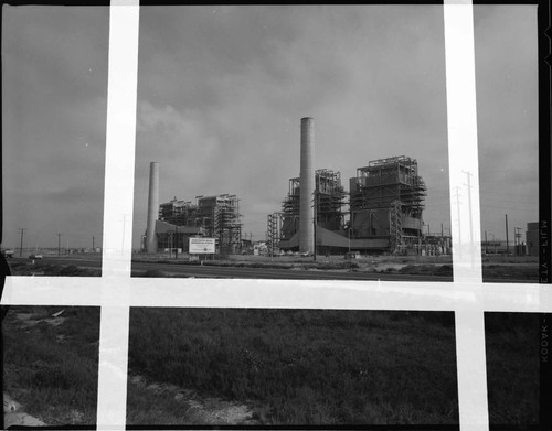 Huntington Beach Generating Station with sign out front