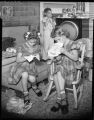 Two little girls and a boy working on Christmas decorations and embroidery with 3 variants