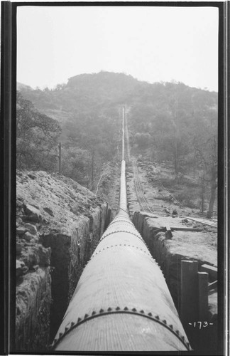 A long view of the pressure pipe at Kaweah #3 Hydro Plant before backfilling