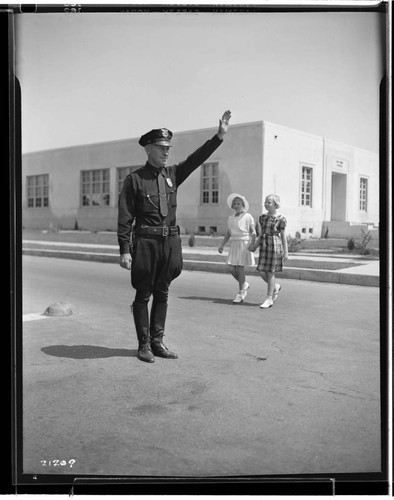 Officer J. H. Deist with children