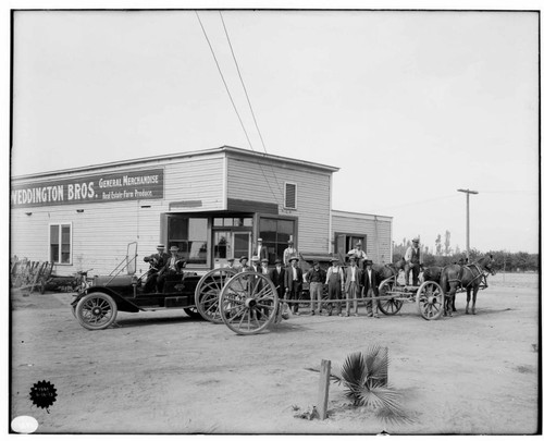 Employees and vehicles (some horse drawn) at Lankershim