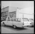 SCE vehicle with radio communication equipment. ; Woman receiving award. ; Shop scenes