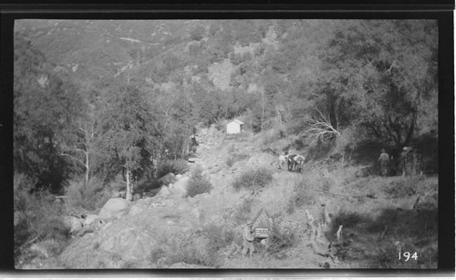 A construction crew surveys the site of the Marble Fork headworks at Kaweah #3 Hydro Plant