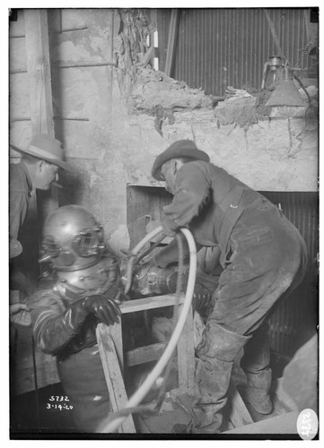 Diver entering intake at Dam #1