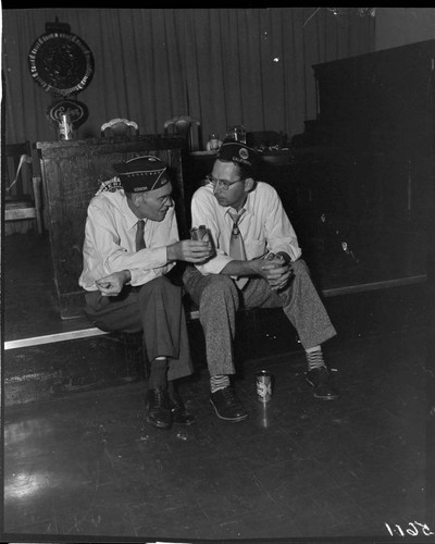 Two American Legion members drinking Eastside beer