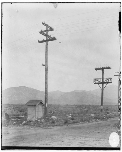 The Santa Ana River 33KV Line: Switch pole (rear). Junction Pole (front)