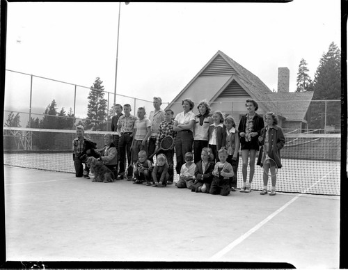 Group shot of 18 kids and adults on Big Creek tennis court