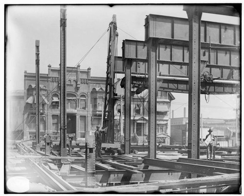 A construction crew working on the Fourth Street General Office building