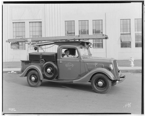 Edison Troubleman's Ford truck in front of Studebaker buildings