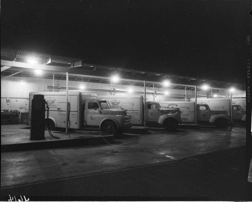 Challenge ice cream trucks lined up at loading dock