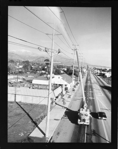 Linemen working on 66kV transmission line