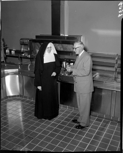 Nun and man in Saint Francis Hospital cafeteria