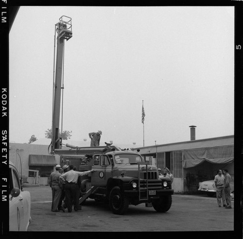 Bucket raised at service center