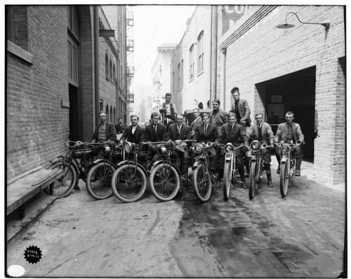 A group of employees from the Los Angeles Trouble Department. [most of them are seated on Indian Mo-