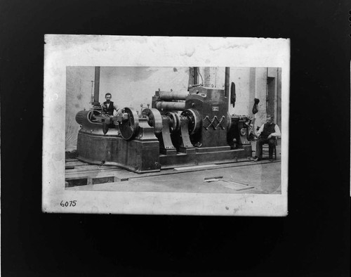 An operator standing by one of the original "Jumbo" dynamos installed at Thomas Edison's Pearl Street Plant in New York City, 1882