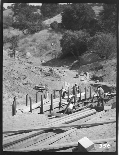 A construction crew working on the flume at the Tule Plant