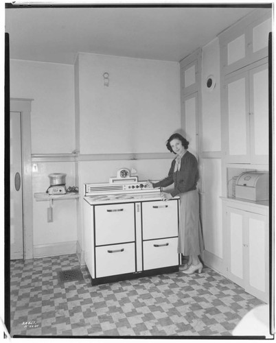 H2.3 - Home Kitchen - Electric Home with Mrs. Vera J. Pickett at electric range