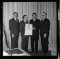 Howard P. Allen receiving awards of recognition from the City and County of Los Angeles