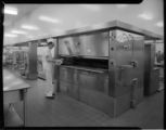 Commercial Kitchen with large ovens and grill areas