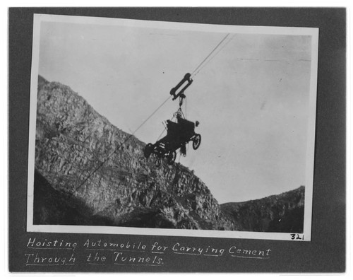 Hoisting the automobile for carrying cement through the tunnels at Kern River #1 Hydro Plant