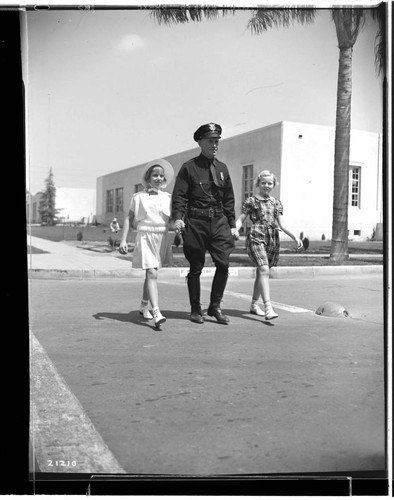 Officer J. H. Deist with children