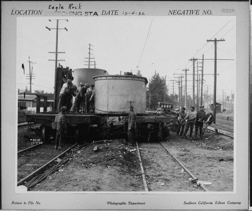 220kV transformer for Eagle Rock Substation on railroad car being transferred to another flat car